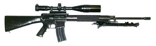 Bushmaster - AR-15 - .223 Remington - Semi-Auto Rifle - 24 Inch Free-Floated, Fluted Heavy Barrel with Miculek muzzle brake - 6 x 24 x 50mm AO Scope - Target Knobs - Mil-Dots - Red, Green, and Blue Illuminated Reticle