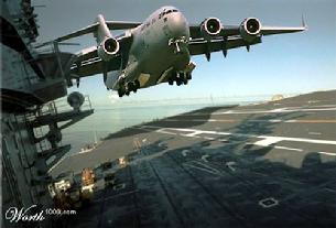 C-17 Globemaster III landing on an aircraft carrier. I'm still waiting for a picture of a C-17 being launched from a carrier.