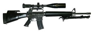 Colt - AR-15 - .223 Remington - A-2 Match Heavy Barrel Sporter - Semi-Auto Rifle - 20 Inch Heavy Barrel with Miculek Muzzle Brake - 6 x 24 x 50mm AO Scope - Target Knobs - Mil-Dots - Red, Green, and Blue illuminated Reticle